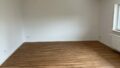 Helle Erdgeschosswohnung mit Holzfußboden, großen Fenstern und viel Platz in Neupotz-Hardtwald.