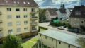 Helle 3-ZKB-Wohnung mit sonnigem Balkon und Mansardenzimmer in Landau, ideal für Familien und Single.